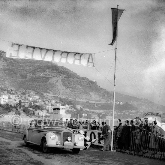 N° 414 Lehmann / Scheube on Mercedes-Benz 300. Rallye Monte Carlo 1953. To prevent the competitors from taking the timekeepers by surprise and passing without being spotted the organisers decided to paint the front wings of the cars white with washable paint. This enabled the officials to identify them a long way off even if their rally plates were not easily visible because of dirt or their position on the car. (Louche p. 118) - Photo by Edward Quinn