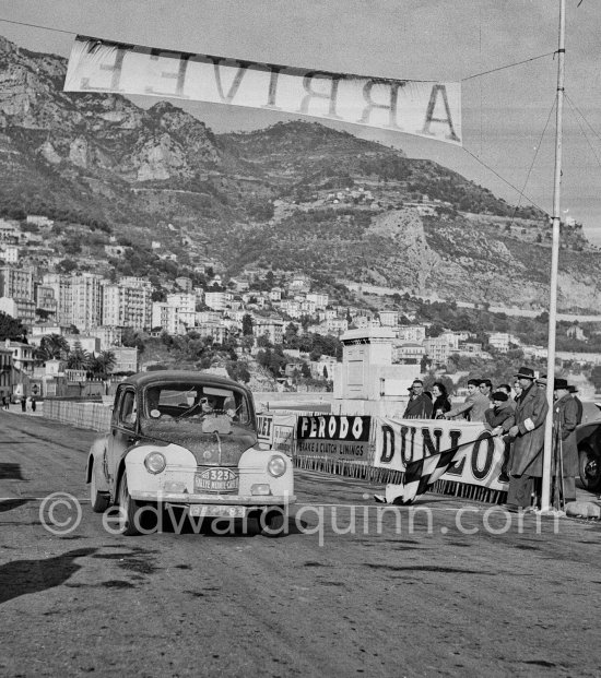 N° 323 Arnaud / Preynat on Renault 4CV Rallye Monte Carlo 1953. To prevent the competitors from taking the timekeepers by surprise and passing without being spotted the organisers decided to paint the front wings of the cars white with washable paint. This enabled the officials to identify them a long way off even if their rally plates were not easily visible because of dirt or their position on the car. (Louche p. 118) - Photo by Edward Quinn