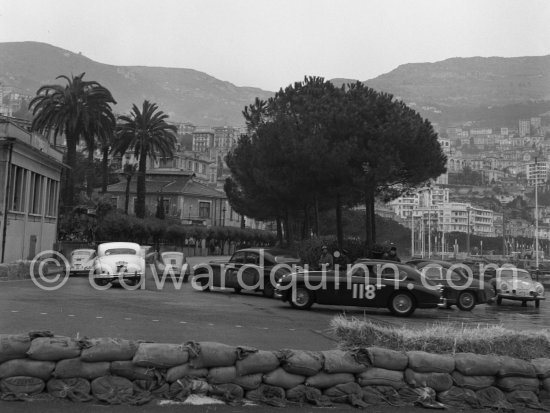 N° 118 Faulkner / Silverthorne on Aston Martin DB2-4, N° 90 Appleyard / Appleyard on Jaguar Mk VII, N° 112 Vard / Jolley on Jaguar MK VII and 3 Porsche 356 taking part in the regularity speed test on the circuit of the Monaco Grand Prix. Rallye Monte Carlo 1955. - Photo by Edward Quinn