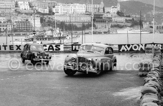 N° 117 Merrill / Matthews on Jaguar Mk VII, N° 198 Ingier / Schjolberg on Sunbeam Talbot 90 Mk III taking part in the regularity speed test on the circuit of the Monaco Grand Prix. Rallye Monte Carlo 1955. - Photo by Edward Quinn