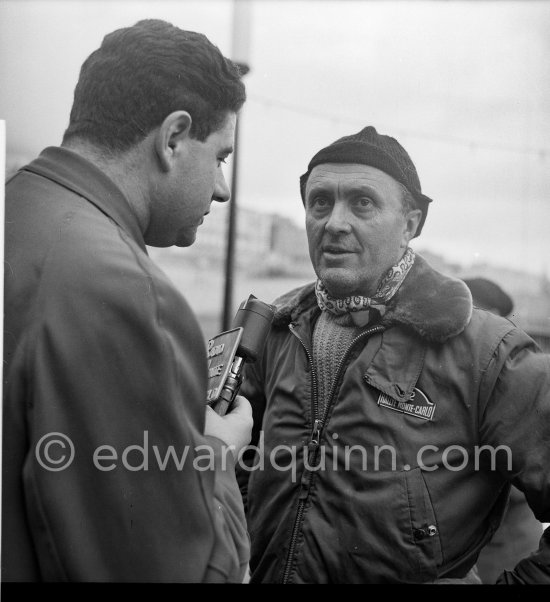 Louis Chiron interviewed for Radio Monte Carlo. N° 32 Lancia Aurélia GT, 1st in Cat. 2, Classe 1. Monte Carlo Rally 1956. - Photo by Edward Quinn