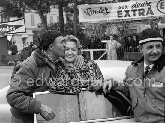 Louis Chiron and his wife. On the right his co-driver Gino Longo N° 32 Lancia Aurélia GT, 1st in Cat. 2, Classe 1. Monte Carlo Rally 1956. - Photo by Edward Quinn