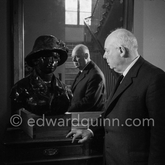 Jean Renoir with the Bust of Madame Renoir, his mother. By Pierre Auguste Renoir. At Domaine des Collettes, the estate of the Renoir family. Cagnes-sur-Mer 1962. - Photo by Edward Quinn