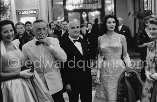 Myriam Bru and Angelo Rizzoli, Italian Film Producer. Cannes Film Festival 1956. - Photo by Edward Quinn