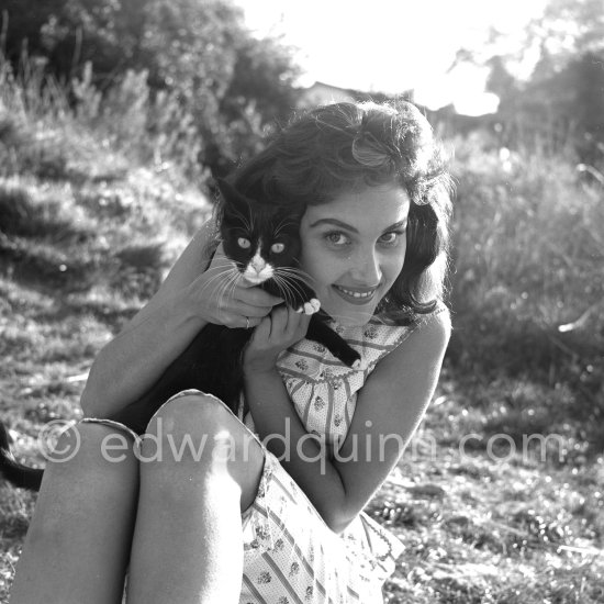 Pascal Roberts, French actress and dancer, in the movie "The Way Out". However, here she tenderly invites her cat to stay. Nice 1957. - Photo by Edward Quinn