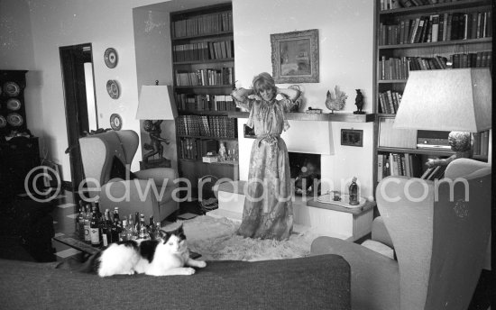 Rachel Roberts, British stage actress and her cat. Rachel was married to actor Rex Harrison. Across from the French Riviera in Portofino 1965. - Photo by Edward Quinn