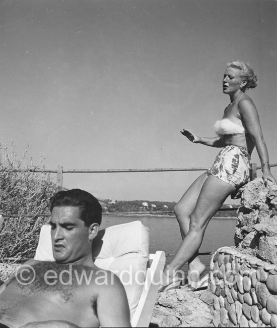 Ginger Rogers and french actor Jacques Bergerac, at Monte Carlo Beach 1952. - Photo by Edward Quinn