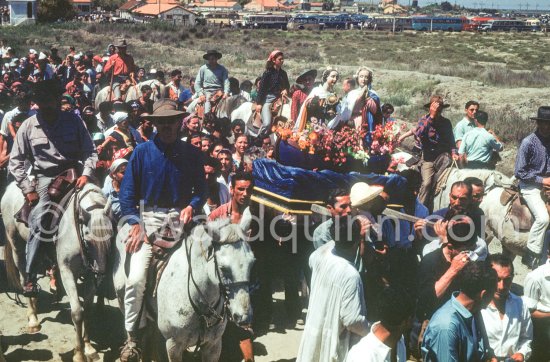 Saint Mary Jacobe, Saint Mary Salome, patron saints of Saintes Maries de la Mer. Gypsies on the occasion of the yearly pilgrimage and festival of the Gypsies in honor of Saint Sara, Saintes-Maries-de-la-Mer in 1953. - Photo by Edward Quinn