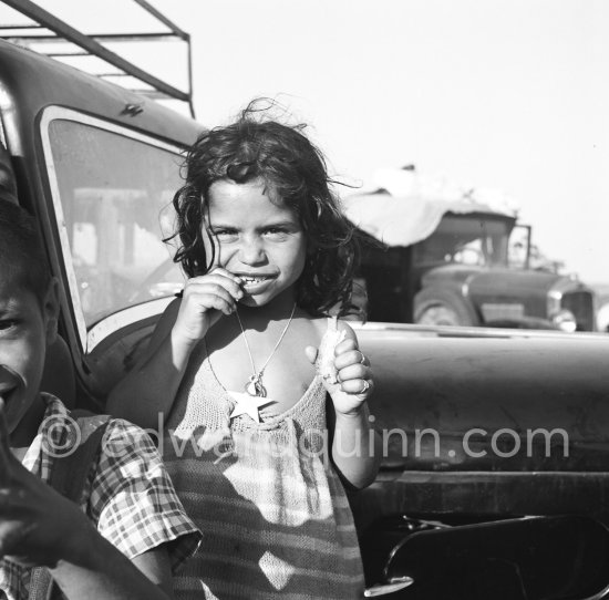 Gypsies on the occasion of the yearly pilgrimage and festival of the Gypsies in honor of Saint Sara, Saintes-Maries-de-la-Mer in 1953. - Photo by Edward Quinn