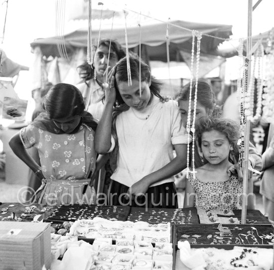 Gypsies on the occasion of the yearly pilgrimage and festival of the Gypsies in honor of Saint Sara, Saintes-Maries-de-la-Mer in 1953. - Photo by Edward Quinn