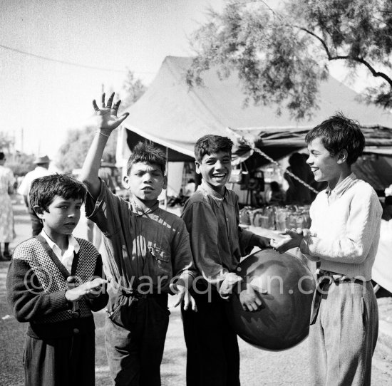 Gypsies on the occasion of the yearly pilgrimage and festival of the Gypsies in honor of Saint Sara, Saintes-Maries-de-la-Mer in 1953. - Photo by Edward Quinn