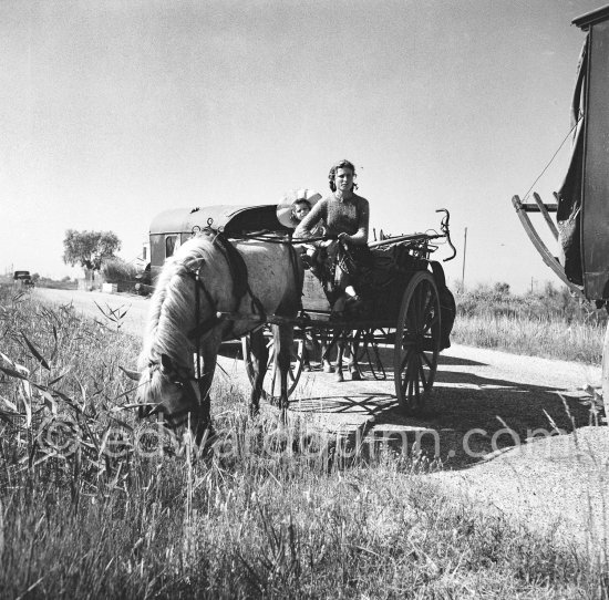 Gypsies on the occasion of the yearly pilgrimage and festival of the Gypsies in honor of Saint Sara, Saintes-Maries-de-la-Mer in 1953. - Photo by Edward Quinn