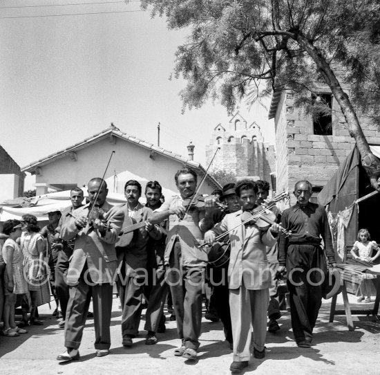 Gypsies on the occasion of the yearly pilgrimage and festival of the Gypsies in honor of Saint Sara, Saintes-Maries-de-la-Mer in 1953. - Photo by Edward Quinn