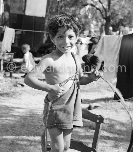 Gypsies on the occasion of the yearly pilgrimage and festival of the Gypsies in honor of Saint Sara, Saintes-Maries-de-la-Mer in 1953. - Photo by Edward Quinn