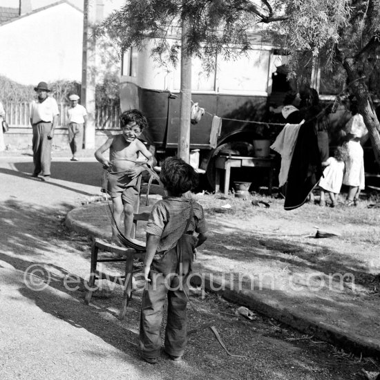 Gypsies on the occasion of the yearly pilgrimage and festival of the Gypsies in honor of Saint Sara, Saintes-Maries-de-la-Mer in 1953. - Photo by Edward Quinn