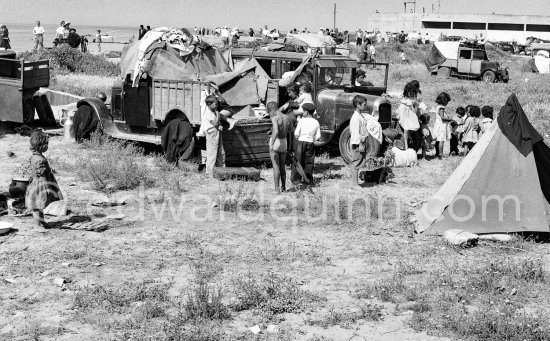 Gypsies on the occasion of the yearly pilgrimage and festival of the Gypsies in honor of Saint Sara, Saintes-Maries-de-la-Mer in 1953. - Photo by Edward Quinn