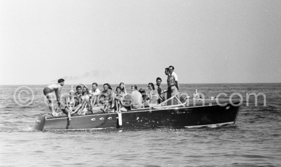 Gunter Sachs and friends on a Riva boat. Saint-Tropez 1961. - Photo by Edward Quinn
