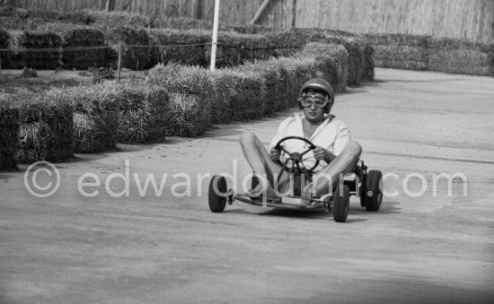 Gunter Sachs on a go-kart track. Saint-Tropez 1961. - Photo by Edward Quinn