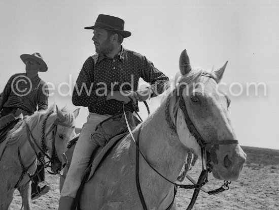 Camargue: Gardians arriving. Saintes-Maries-de-la-Mer in 1953. - Photo by Edward Quinn