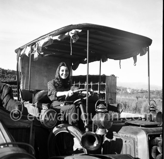 French actress Jacqueline Sassard at an automobile graveyard. Nice 1956. - Photo by Edward Quinn