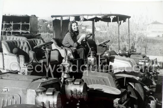 French actress Jacqueline Sassard at an automobile graveyard. Nice 1956. - Photo by Edward Quinn