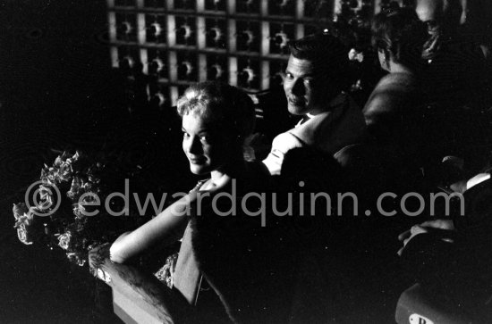 Romy Schneider, the belle of the 1957. Cannes Film Festival with her co-star Karlheinz Böhm, at the screening of their ﬁlm, "Sissi, l\'lmperatrice", on the last night of the Festival. - Photo by Edward Quinn