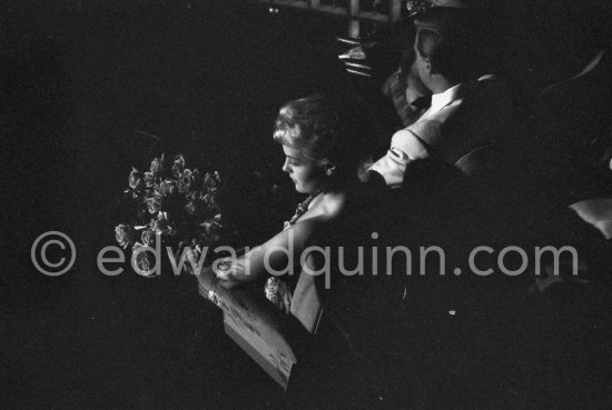 Romy Schneider, the belle of the 1957. Cannes Film Festival with her co-star Karlheinz Böhm, at the screening of their ﬁlm, "Sissi, l\'lmperatrice", on the last night of the Festival. - Photo by Edward Quinn