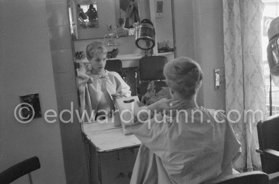 Romy Schneider at the hairdresser. Cannes Film Festival 1957. - Photo by Edward Quinn