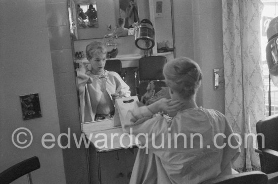 Romy Schneider at the hairdresser. Cannes Film Festival 1957. - Photo by Edward Quinn