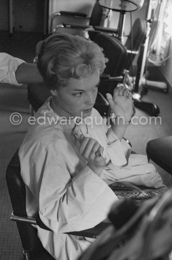 Romy Schneider at the hairdresser. Cannes Film Festival 1957. - Photo by Edward Quinn