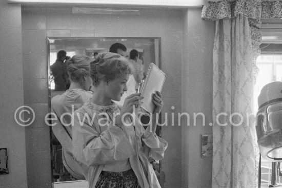 Romy Schneider at the hairdresser. Cannes Film Festival 1957. - Photo by Edward Quinn