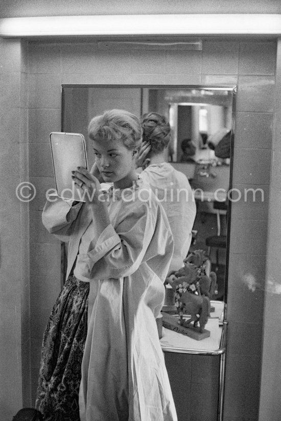 Romy Schneider at the hairdresser. Cannes Film Festival 1957. - Photo by Edward Quinn