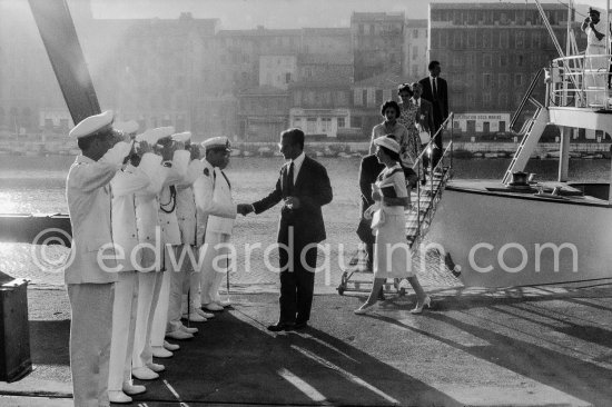 The Shah of Persia and Soraya with the crew of his Yacht Chashvar. Nice 1957. - Photo by Edward Quinn