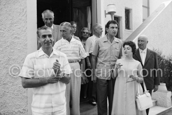 The Shah of Persia, his daughter Princess Shahnaz and husband Ardeshir Zahedi. Cannes 1958. - Photo by Edward Quinn