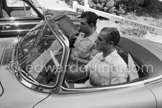 At the wheel Reza Pahlavi, the Shah of Persia. With him his son-in-law Ardeshir Zahedi. Nice Airport 1958. Car: Mercedes-Benz 300 SL - Photo by Edward Quinn