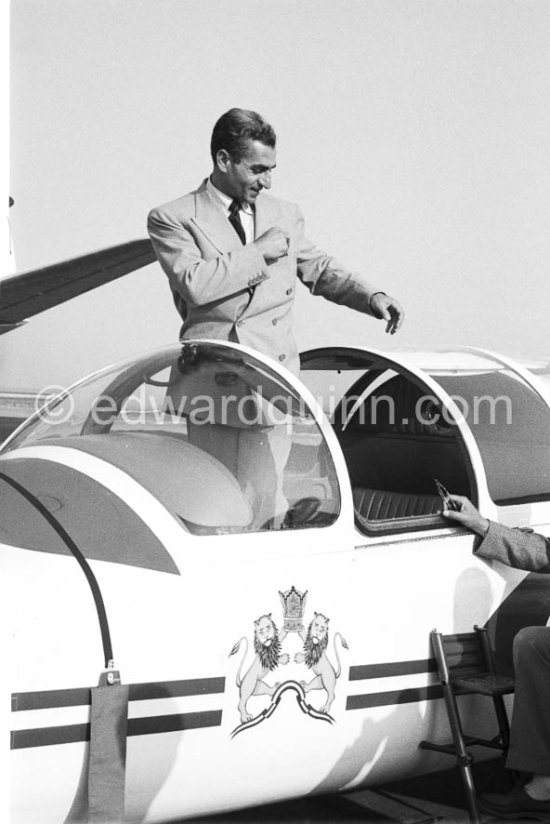 The Shah of Persia in his plane. Coat of arms of Iran\'s Sovereign. Nice Airport 1958. - Photo by Edward Quinn