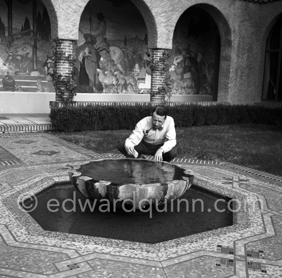 George Simenon at his Villa Golden Gate. Cannes 1955. - Photo by Edward Quinn