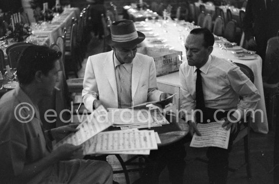 Frank Sinatra rehearsing with the orchestra at the Sporting d’Eté. Princess Grace, who was president of the Monégasque Red Cross, persuaded Sinatra to come back to Europe to sing at a gala in aid of refugee children. Monte Carlo 1958. - Photo by Edward Quinn