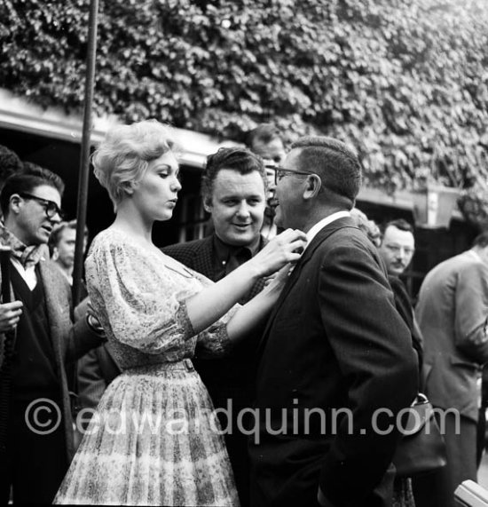 Rod Steiger, Kim Novak and director Mark Robson. For the film "The Harder They Fall". Cannes Film Festival 1956. - Photo by Edward Quinn