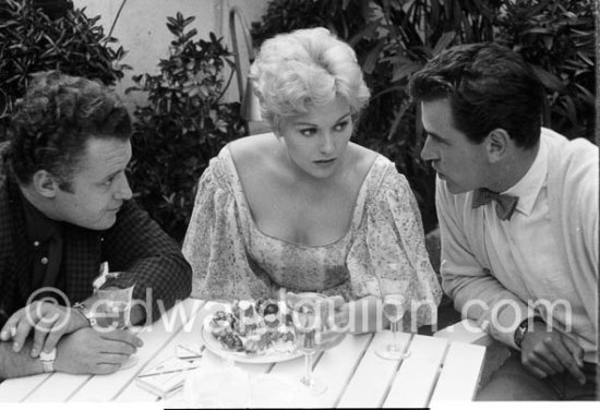 Rod Steige, Laurence Harvey and Kim Novak. For the film "The Harder They Fall". Cannes Film Festival 1956. - Photo by Edward Quinn