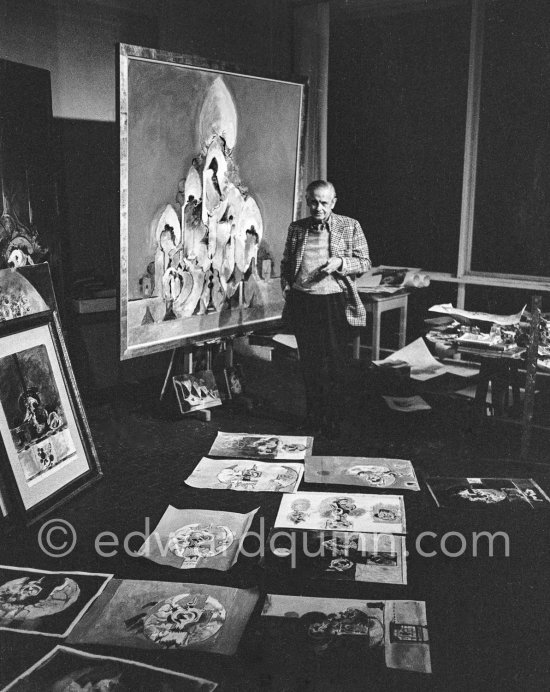 Graham Sutherland in his workshop at La Villa Blanche, with painting "Cathedral", 1975, and lithographs. Menton 1975. - Photo by Edward Quinn