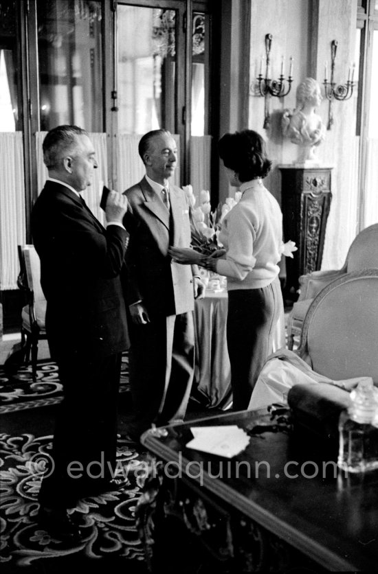 Attended by Cartier jewellers Liz Taylor tries on a beautiful diamond necklace with matching earrings she spotted while window-shopping in Monte Carlo with her third husband Mike Todd. At $500,000, the necklace was beyond Todd’s budget, but the earrings were her consolation prize. Monte Carlo 1958. - Photo by Edward Quinn