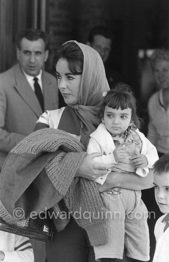 Liz Taylor outside the Carlton Hotel, Cannes, with her daughter Liza Todd from her third marriage to Mike Todd, Cannes 1959. - Photo by Edward Quinn