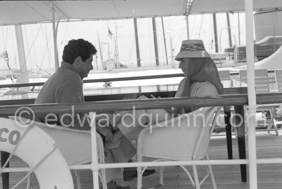 Liz Taylor and her new husband Eddie Fisher on board the yacht Olnico, which they had chartered for their honeymoon cruise of the Mediterranean and berthed in the harbor at Cannes, 1959. - Photo by Edward Quinn