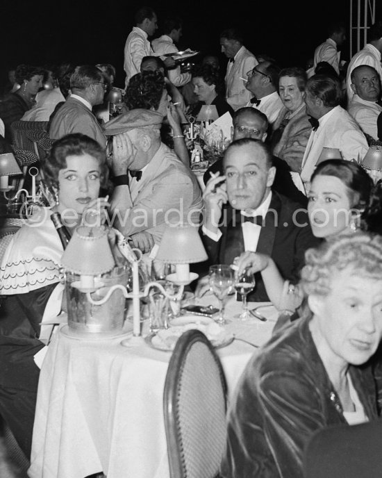 Totò, Italian comedian, real name Prince Griffo Focas Flavio Ducas Comneno Porfirogenito Gagliardi De Curtis di Bisanzio, with his wife Franca Faldini (right), at a summer gala. Monte Carlo 1954. - Photo by Edward Quinn