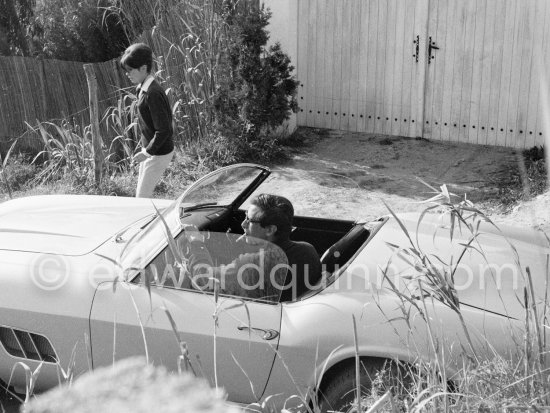 Roger Vadim and Catherine Deneuve, rarely seen with dark hair. Saint-Tropez 1961. Car: 1961 Ferrari 250 GT SWB Spyder California serial number 2175GT - Photo by Edward Quinn