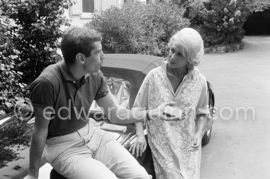 Roger Vadim and Martine Carol during shooting of "Un soir sur la plage". Nice 1961. Car: Lancia Aurelia B24 Convertibile 1956 or 57 - Photo by Edward Quinn