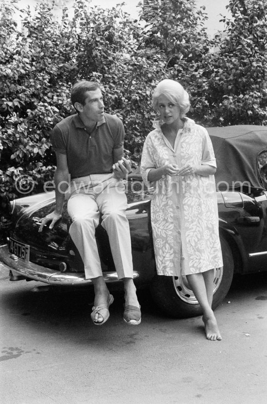 Roger Vadim and Martine Carol during shooting of "Un soir sur la plage". Nice 1961. Car: Lancia Aurelia B24 Convertibile 1956 or 57 - Photo by Edward Quinn