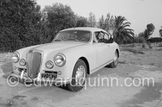 Henri Vidal. Studios de la Victorine, during filming of "Voulez-vous danser avec moi?". Nice 1959. Car: 1958 Lancia Aurelia B20 Gran Turismo 2500 - Photo by Edward Quinn