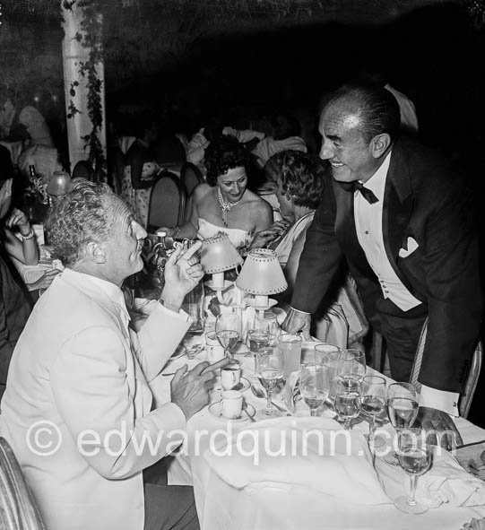 Film producer Darryl F. Zanuck, left,and Jack Warner (Warner Brothers) at Polio Gala, Sporting d'Eté. Monaco 1954 - Photo by Edward Quinn